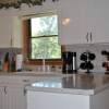 solid surface countertop w/ laminate cabinets